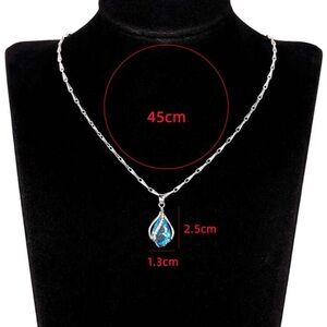 Elegant Silver Necklace with Blue Teardrop Pendant